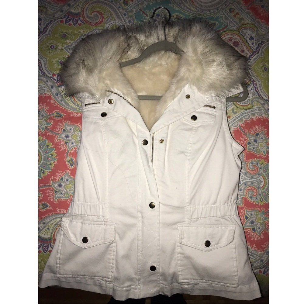 Never worn INC faux fur vest. Fur is removable.